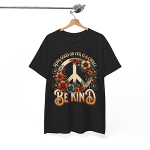 Black t-shirt with peace symbol and floral design on a hanger against a white background