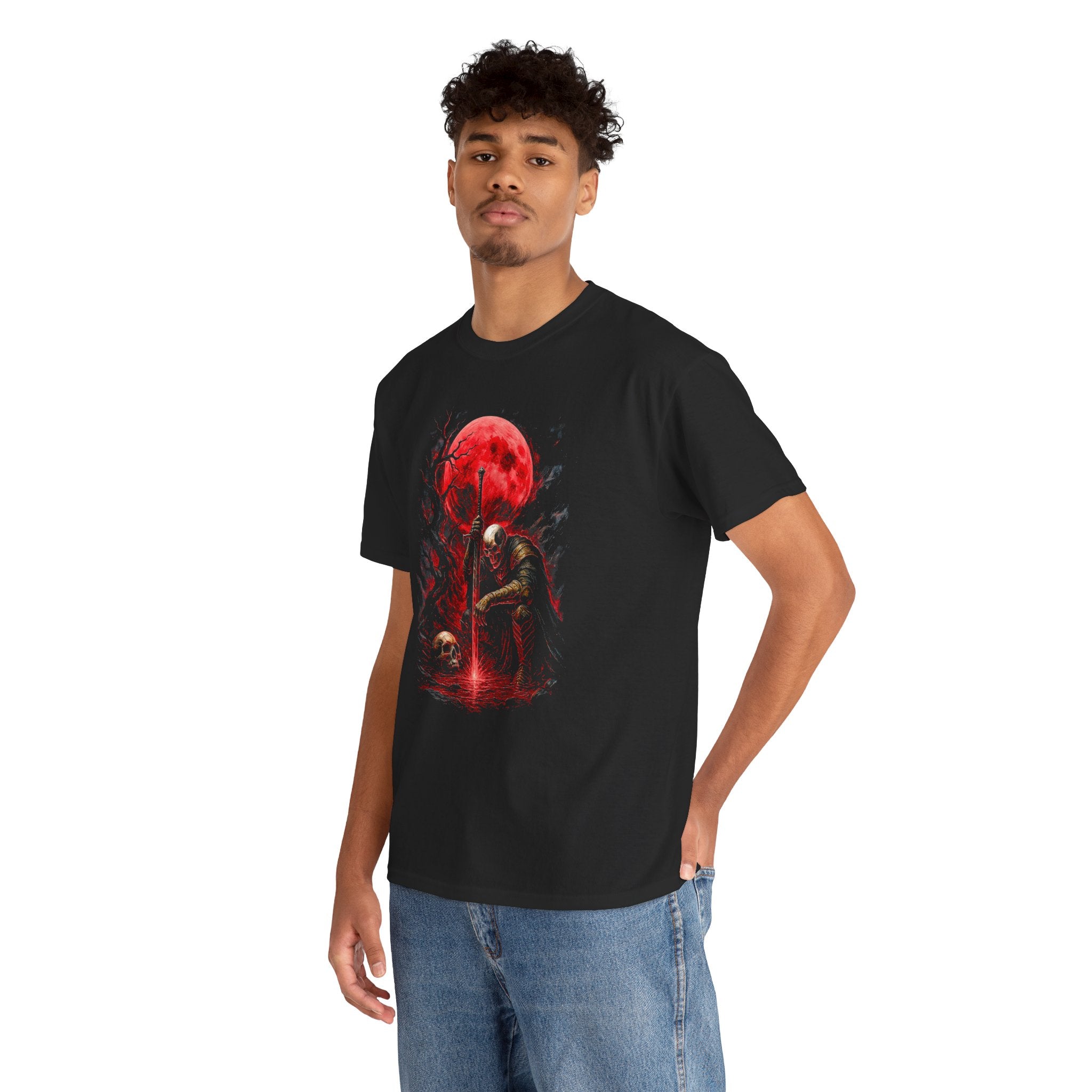 Person wearing a black t-shirt with a graphic design of a red moon and silhouette.