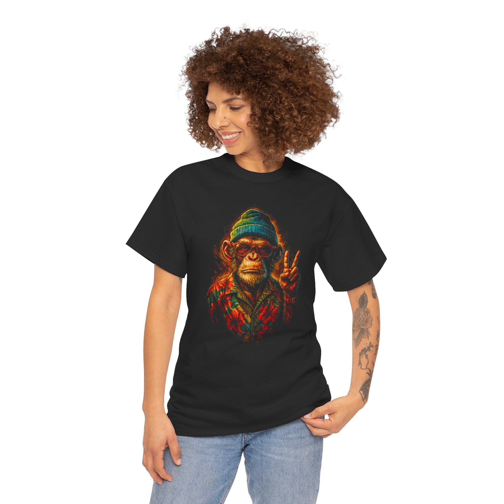 Person wearing a black t-shirt with a colorful monkey graphic design on a white background