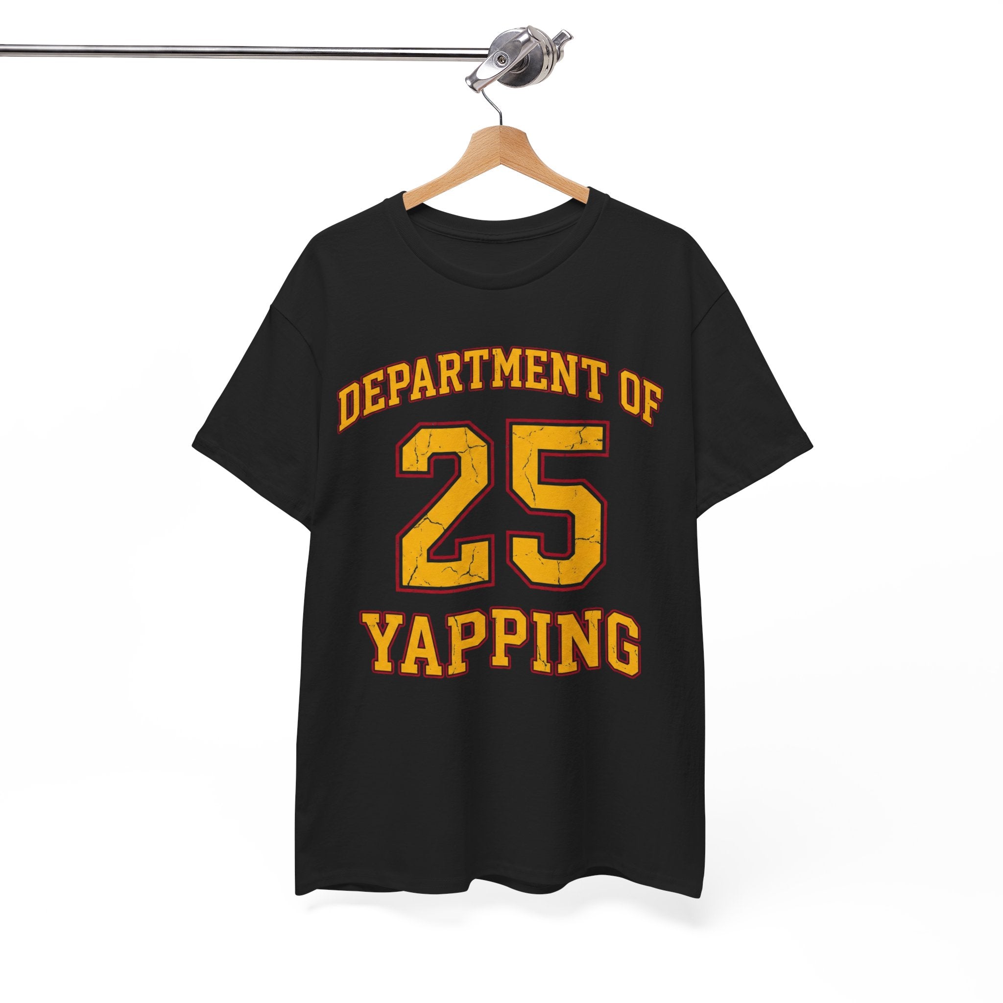 Black t-shirt with yellow text 'DEPARTMENT OF 25 YAPPING' on a hanger against a white background