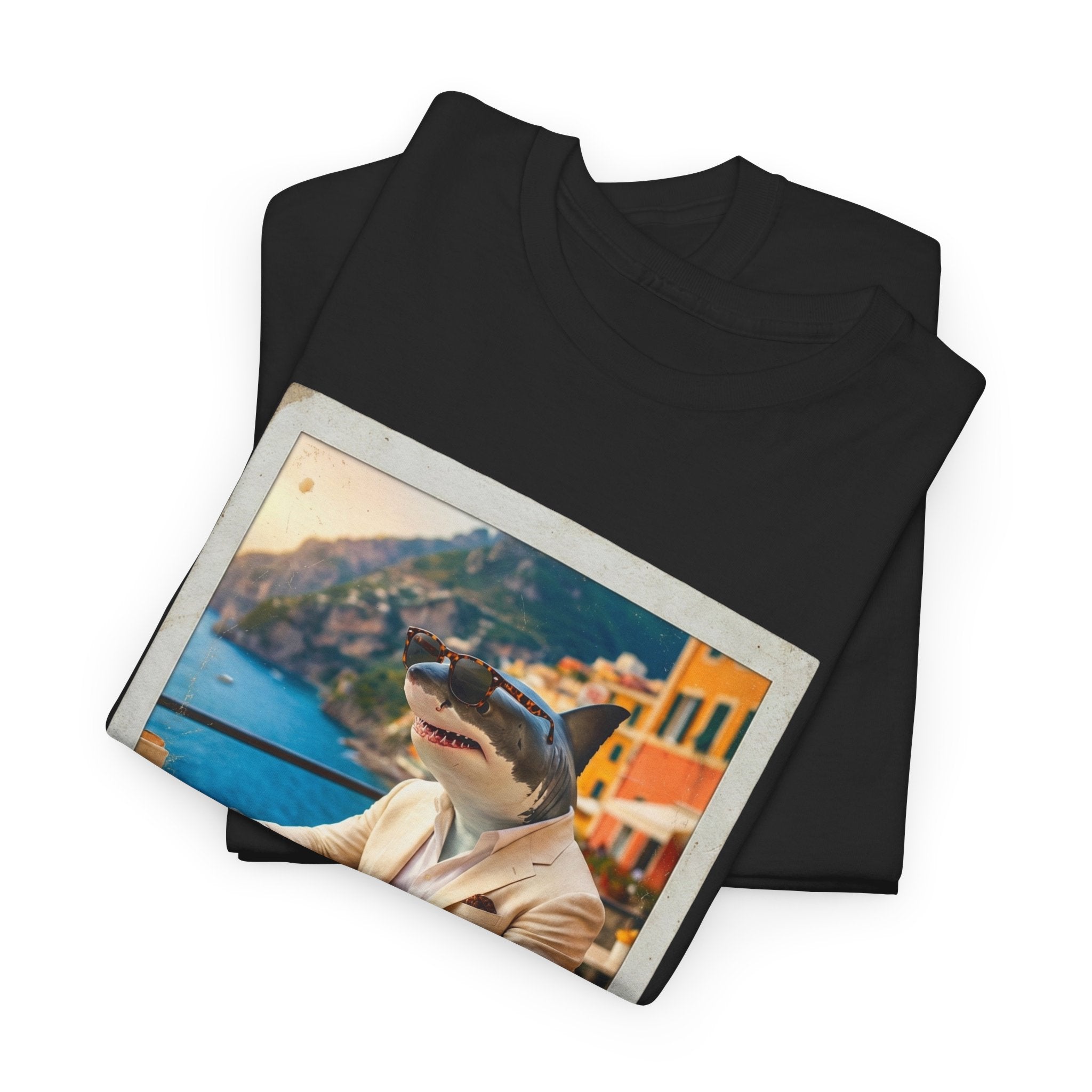 Black t-shirt with a graphic of a dog wearing sunglasses on a scenic background