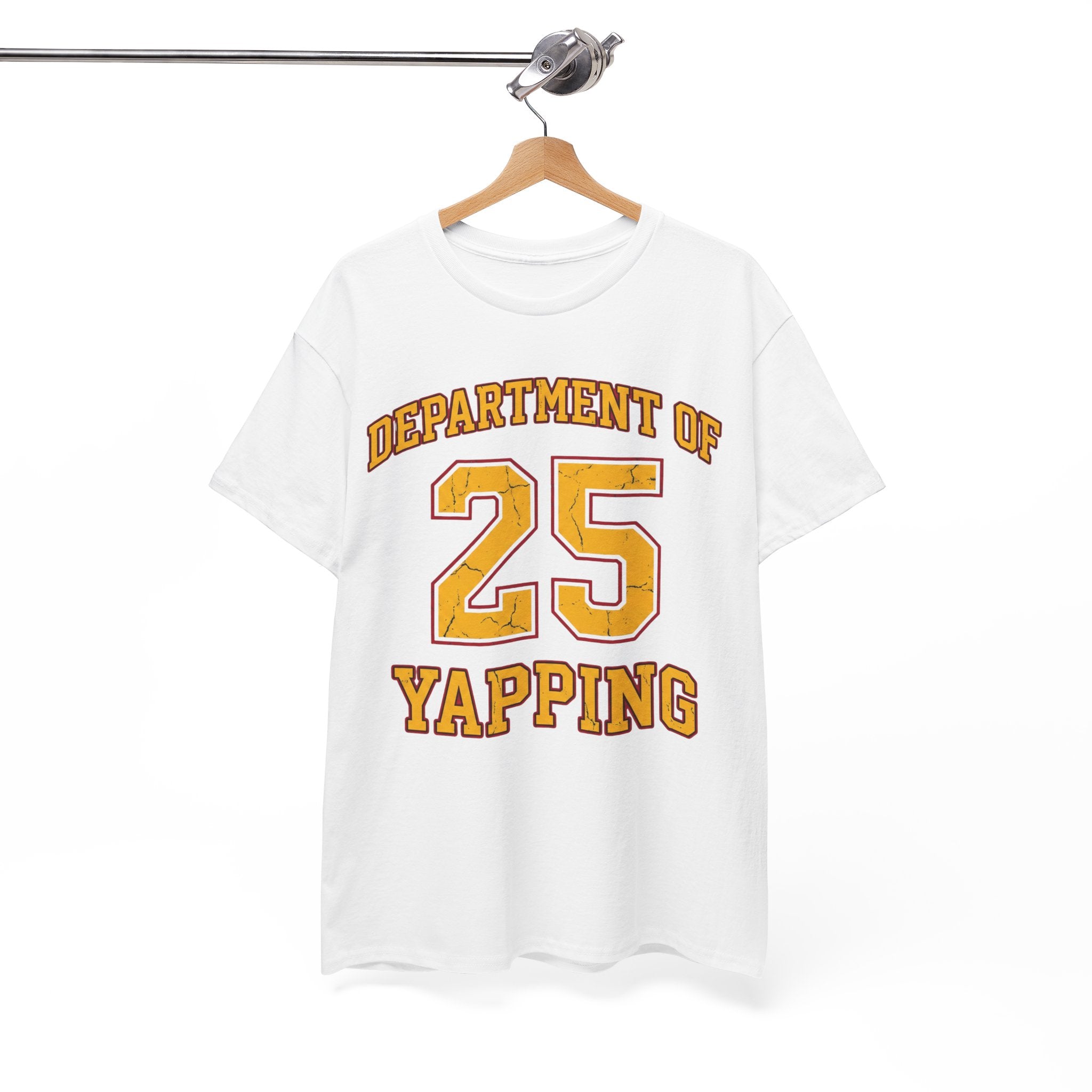 White t-shirt with yellow text 'DEPARTMENT OF YAPPING' on a hanger against a white background